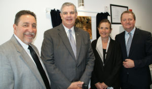 Group photo of VIPs at the new building