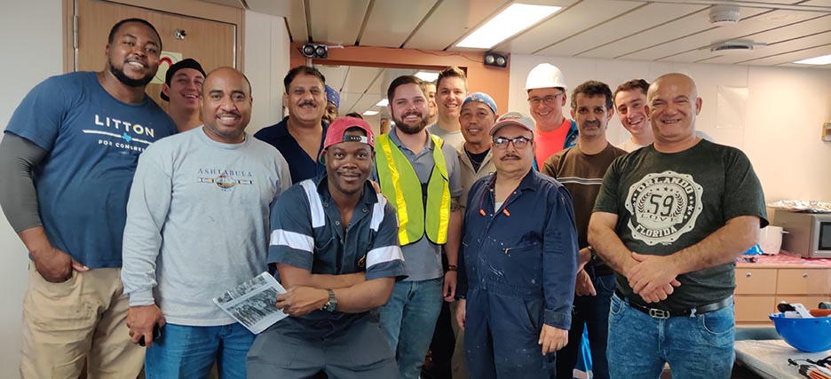 Group photo of people aboard ship