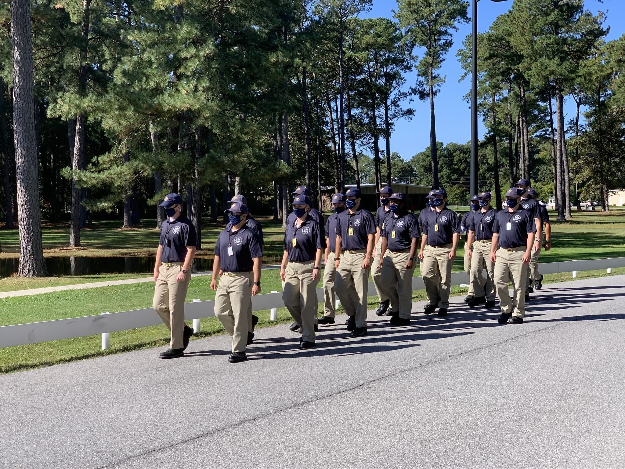 Photo of apprentices marching on campus