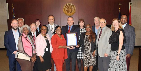 Group photo including Bryan Powell and port commissioners