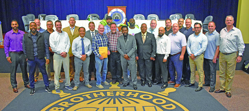 Group photo of members and officials in Piney Point